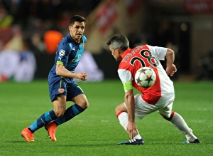 Monaco V Arsenal 2014/15 Prints: Clash of Titans: Sanchez vs. Toulalan - Monaco vs