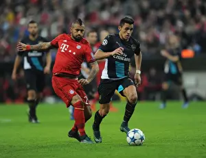 Bayern Munich V Arsenal 2015-16 Prints: Clash of Titans: Sanchez vs. Vidal - Bayern Munich vs. Arsenal UCL Showdown