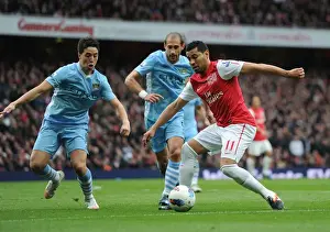 Arsenal V Manchester City 2011-12 Prints: Clash of Titans: Santos vs Nasri