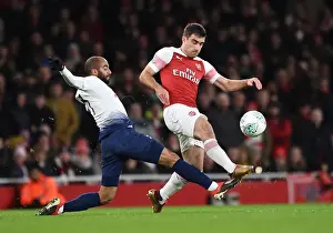 Arsenal V Tottenham Hotspur Carabao Cup 2018-19 Prints: Clash of Titans: Sokratis vs. Lucas Moura - Arsenal vs. Tottenham Carabao Cup Showdown