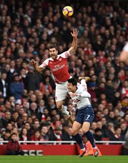 Images Dated 2nd December 2018: Clash of Titans: Sokratis vs. Son in the North London Derby