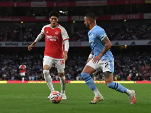 Arsenal V Manchester City 2023-24 Prints: Clash of Titans: Tomiyasu vs Walker - Arsenal vs Manchester City Showdown (2023-24)