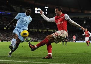 Images Dated 18th December 2011: Clash of Titans: Van Persie vs. Toure - A Battle of Champions (Manchester City vs)