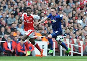 Images Dated 7th May 2017: Clash of Titans: Welbeck vs Jones - Arsenal vs Manchester United, Premier League 2016-17