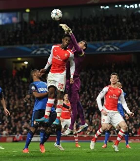 Images Dated 25th February 2015: Clash of Titans: Welbeck vs. Subasic in Arsenal vs. Monaco UCL Showdown