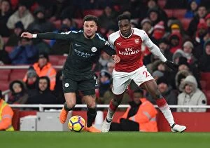 Arsenal v Manchester City 2017-18 Collection: Clash of Titans: Welbeck vs. Walker in Arsenal vs. Manchester City Showdown