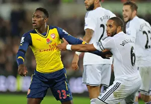 Clash of Titans: Welbeck vs. Williams in Swansea's Battle Against Arsenal