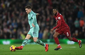 Images Dated 29th December 2018: Clash of Titans: Wijnaldum vs. Ramsey - Liverpool vs. Arsenal, Premier League, 2018-19