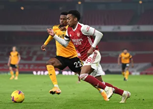 Clash of Titans: Willock vs. Semedo - Arsenal vs. Wolverhampton Wanderers, Premier League 2020-21: A Battle in the Empty Emirates Stadium