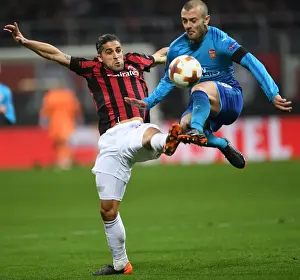 AC Milan V Arsenal 2017-18 Prints: Clash of Titans: Wilshere vs. Rodriguez in the Europa League Showdown - Arsenal vs