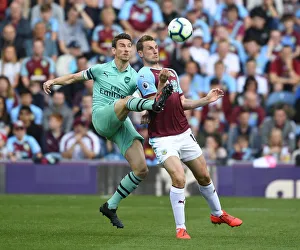 Burnley V Arsenal 2018-19 Prints: Clash at Turf Moor: Koscielny vs. Wood in Burnley vs. Arsenal Premier League Showdown