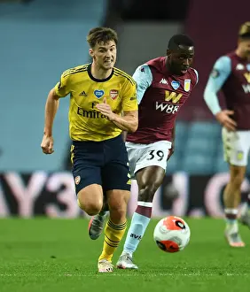 Clash at Villa Park: Kieran Tierney Faces Keinan Davis in Intense Aston Villa vs. Arsenal FC Showdown (Premier League 2019-20)