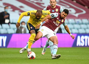 Clash at Villa Park: Lacazette vs. Trezeguet in Intense Aston Villa vs. Arsenal FC Premier League Showdown