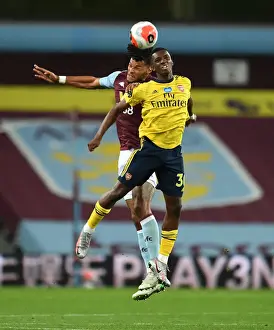Clash at Villa Park: Nketiah vs. Mings in Premier League Showdown