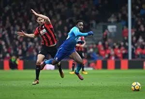 AFC Bournemouth V Arsenal 2017-18 Prints: Clash at Vitality: Francis Tangles with Welbeck in AFC Bournemouth vs Arsenal Showdown