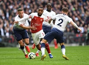 Tottenham Hotspur v Arsenal 2018-19 Collection: Clash at Wembley: Lacazette Faces Off Against Alderweireld and Trippier