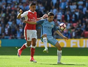 Images Dated 23rd April 2017: Clash at Wembley: Sanchez vs. Navas in the FA Cup Semi-Final Showdown