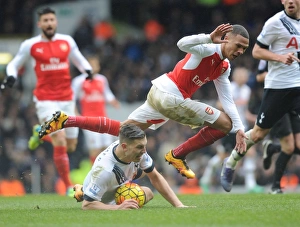 Clash at White Hart Lane: Gibbs vs. Wimmer - Arsenal vs. Tottenham's Intense Battle in the Premier League