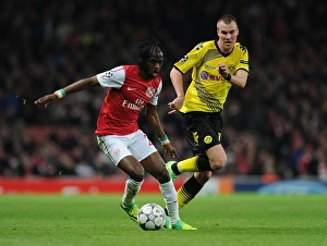 Arsenal V Borussia Dortmund 2011-12 Prints: Clash of Wings: Gervinho vs. Grosskreutz in Arsenal vs