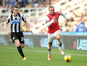 Newcastle United Collection: Clash of Wings: Gibbs vs Debuchy - Newcastle United vs Arsenal, 2013-14 Premier League