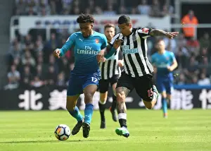 Newcastle United V Arsenal 2017-18 Prints: Clash of Wings: Iwobi vs. Kenedy - A Premier League Showdown
