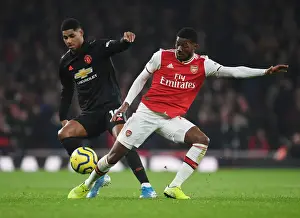 Clash of the Wings: Maitland-Niles vs Rashford in Arsenal vs Manchester United Premier League Showdown