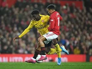 Clash of Wings: Saka vs Young - Premier League Battle at Old Trafford