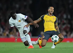 Arsenal V FC Basel 2016-17 Prints: Clash of Wings: Theo Walcott vs