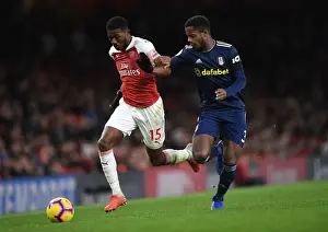 Arsenal V Fulham 2018-19 Prints: Clash of the Young Talents: A Battle Between Ainsley Maitland-Niles and Ryan Sessegnon in the Premier League