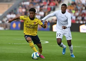 Angers SCO V Arsenal 2019-20 Prints: Clash of Young Talents: Nelson vs Reine-Adelaide in Arsenal's Pre-Season Battle against Angers