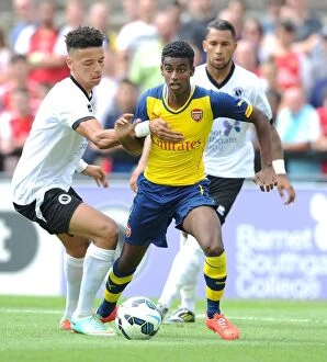 Images Dated 19th July 2014: Clash between Zelalem and Angol: A Pre-Season Battle at Boreham Wood