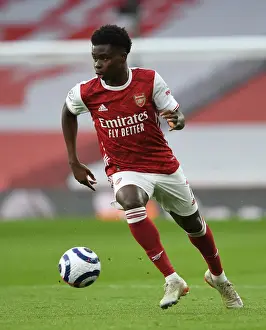 Behind Closed Doors: Bukayo Saka in Action for Arsenal Against Manchester City, Premier League 2021