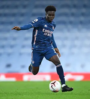 Behind Closed Doors: Bukayo Saka's Premier League Showdown - Arsenal vs. Manchester City, 2020-21