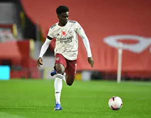 Behind Closed Doors: Bukayo Saka's Premier League Showdown at Old Trafford - Manchester United vs. Arsenal (2020-21)
