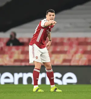 Arsenal V Olympiacos 2020-21 Prints: Behind Closed Doors: Granit Xhaka in UEFA Europa League Action for Arsenal Against Olympiacos