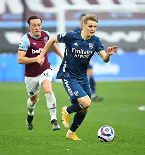 Behind Closed Doors: Martin Odegaard Outsmarts Noble in Arsenal's Triumph over West Ham, Premier League 2021