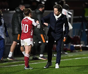 Images Dated 19th March 2021: Behind Closed Doors: Montemurro and Little's Victory Celebration - Arsenal Women Triumph Over