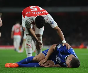 Arsenal V Everton 2015/16 Prints: Compassion on the Field: Oxlade-Chamberlain Consoles Injured Jagielka (Arsenal vs)