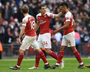 Images Dated 2nd March 2019: Consoling Aubameyang: A Moment of Empathy Between Xhaka and Arsenal Teammate Amidst Rivalry