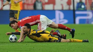 Bayern Munich V Arsenal 2016-17 Prints: Coquelin Fouls Alonso: Intense Battle in Bayern Munich vs Arsenal UEFA Champions League Clash