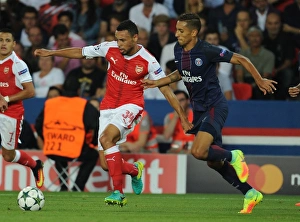 Paris Saint Gernain V Arsenal 2016-17 Prints: Coquelin Overcomes Marquinhos