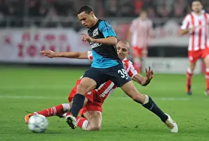 Olympiacos V Arsenal 2011-12 Prints: Coquelin vs. Djebbour: Battle in Athens - Olympiacos vs