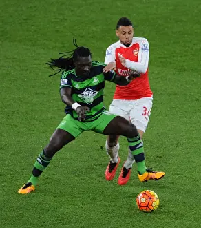 Arsenal V Swansea City 2015-16 Prints: Coquelin vs Gomis: Intense Battle in Arsenal's Premier League Clash Against Swansea City