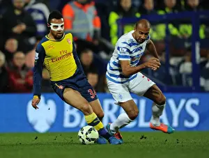 Queens Park Rangers V Arsenal 2014-15 Prints: Coquelin vs. Henry: Intense Battle in Queens Park Rangers vs. Arsenal Premier League Clash