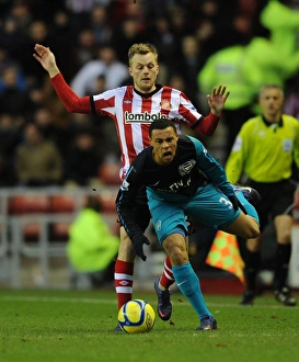 Sunderland V Arsenal - FA Cup 2011-12 Prints: Coquelin vs Larsson: FA Cup Clash Marred by Injury