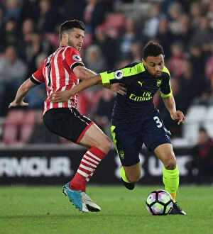 Images Dated 10th May 2017: Coquelin vs. Long: A Fierce Battle in the Southampton vs. Arsenal Premier League Clash (2016-17)