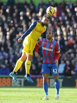 Images Dated 21st February 2015: Coquelin vs. Puncheon: A Footballing Battle at Selhurst Park - Crystal Palace vs. Arsenal (2014-15)