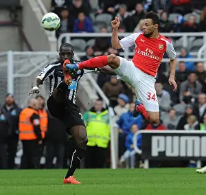 Newcastle United V Arseal 2014/15 Prints: Coquelin vs Sissoko: Intense Battle in Newcastle United vs Arsenal Premier League Clash