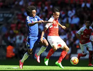 Coquelin vs. Willian: A Footballing Battle in the FA Community Shield Clash Between Arsenal and Chelsea