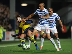 Queens Park Rangers V Arsenal 2014-15 Prints: Coquelin vs Zamora: Intense Battle in Queens Park Rangers vs Arsenal Premier League Clash
